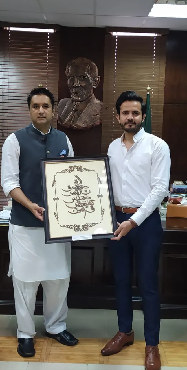 Archived photograph of the Sukh team receiving appreciation from DC Islamabad